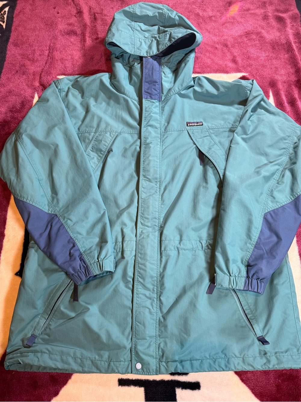 Patagonia Teal Hooded Raincoat with Navy Accents